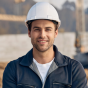 Man at construction site in hard hat