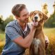 A man playing with a dog