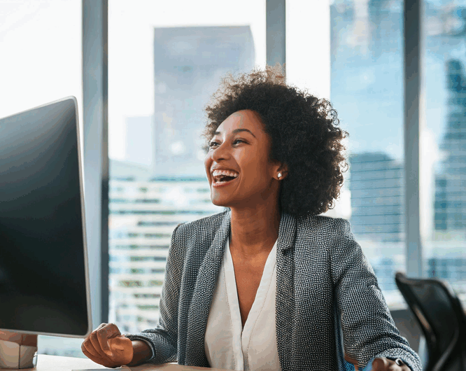 business-images A business woman smiling in an office